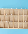 Top Shelf Wooden Jewelry Display Tray With Plush Velvet Lining For Earrings Bangles And Necklaces 18 Slot Pine Wood Storage Rack with burlap compartments.