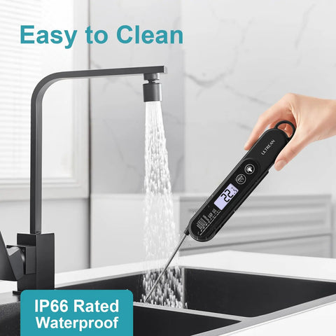 Ultra Fast Digital Meat Thermometer With Backlight And Foldable Probe being cleaned under a kitchen tap, showing waterproof feature