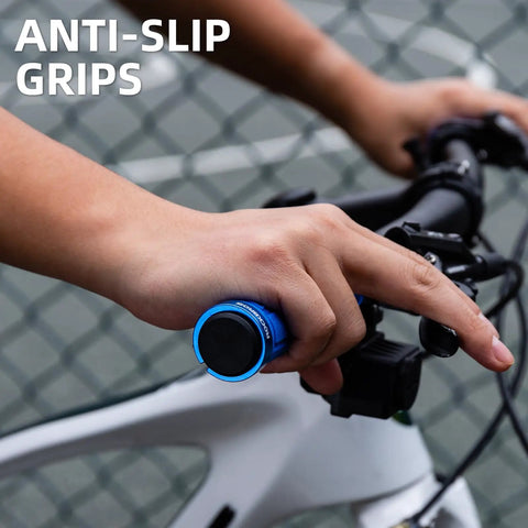 Close-up of hand holding blue Double Lock On Bike Handlebar Grips Non Slip Grippy Comfort Rubber Grips on bicycle handlebar.
