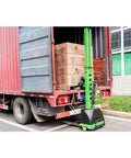 Heavy Duty Electric Pallet Stacker Battery Powered Forklift Truck moving boxes from truck for warehouse material handling.