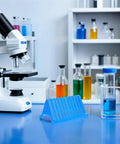 Cool Homoyoyo Lab Slide Drying Rack Pack in a lab with microscope and colorful glassware on the counter.