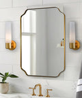 Bathroom with Saber Wall Sconce 1 Light 60W Max Honey Gold Finish 12.5 Inch High 4.75 Inch Wide Dimmable on each side of mirror