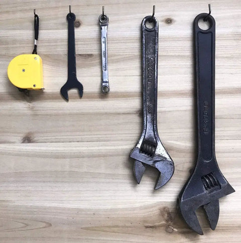 Rock Solid Black L Shape Screw Hooks Heavy Duty Wall Mount Hangers Super Durable Rust Proof Steel Cup Hooks For Shed Garden Patio Closet Storage Solutions 20 Pieces holding various tools on wooden surface.