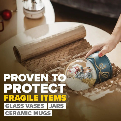 Green Packing Cushion Wrap that expands to fill any box, 12 inch by 50 foot, being used to wrap a fragile glass item.