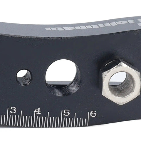 Close-up of Knockout Centering Dowel Jig For Woodworkers With Rock Solid Aluminum Build showing measurement markings and holes.