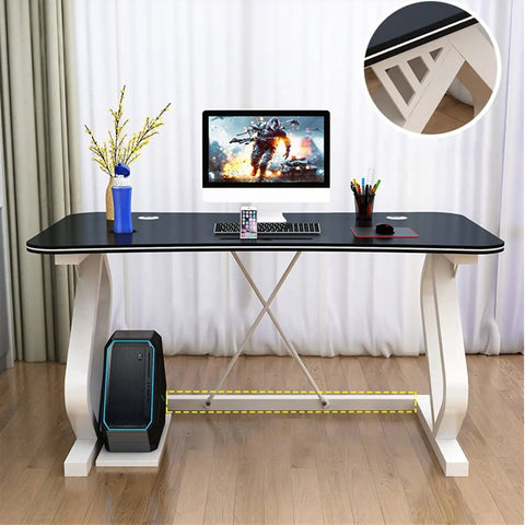 Modern White Gaming Desk Featuring A Built In Phone Slot And Side Storage Shelf, Ergonomic Arc Edge Layout For Smooth Typing with a sleek black top.