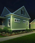 HomeGuard 2 Light LED Outdoor Flood Lights With Motion Sensor And Dusk To Dawn illuminating house and driveway at night