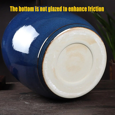 Kitchen Game Changer Top Shelf Blue Porcelain Rice Jar Snug Sealed Grain Bin For Flour Coffee Or Tea Heavy Duty Storage Bucket bottom view showing unglazed surface for added grip.