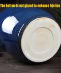 Heavyweight Ceramic Pantry Canister With Secure Snap Lid, base view showing unglazed bottom for enhanced friction.