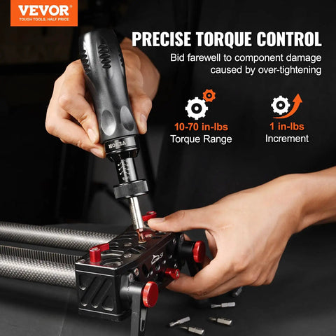 Hands using Pro Grade Torque Screwdriver With One Quarter Inch Drive Precise 10 To 70 Inch Pounds Adjustable Torque on equipment
