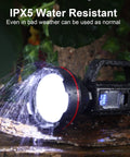 Ultra Bright Rechargeable Spotlight Flashlight With Shoulder Strap And USB Output, shown water resistant under rain
