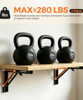 Rock Solid Folding Shelf Brackets 16 Inch Set Of 4 Black Stainless Steel Wall Mount Collapsible Triangle L Brackets supporting kettlebells on shelf.
