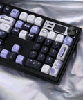 Next Level Full Size Mechanical Keyboard Barebones Kit Decked Out With Smart Screen And Volume Knob Hot Swappable Gasket Mount Tri Mode Wireless Qmk Via Programmable Legit Smooth Rgb Backlit Board Black close-up view of keys and rotary knob.