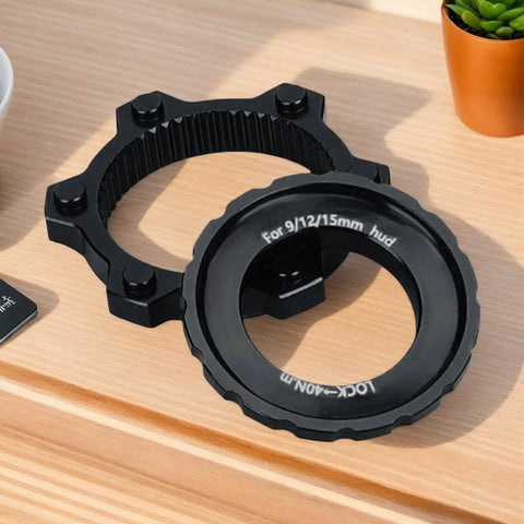 Center Lock Adapter For Bikes Lightweight Aluminum Disc Brake Rotor Upgrade displayed on wooden surface