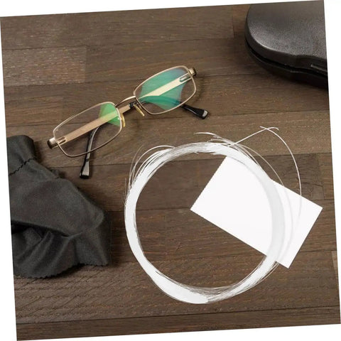 Half Frame Glasses Thread Replacement Kit For Eyeglasses, Eyewear Repair String And Nylon Temple Tips Lanyard on wooden surface