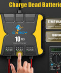 Person operating Three Bank 12V Battery Charger With 30A Total Output, showing display and mode switches, with voltmeter.