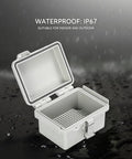 Rugged Outdoor Junction Box IP67 Waterproof With Hinged Gray Cover And Stainless Steel Latch, Built Tough With Mounting Plate, Wall Brackets, DIN Rail Ready Interior For Terminal Blocks, Relays, And Power Supplies, 120x90x70mm open in rain