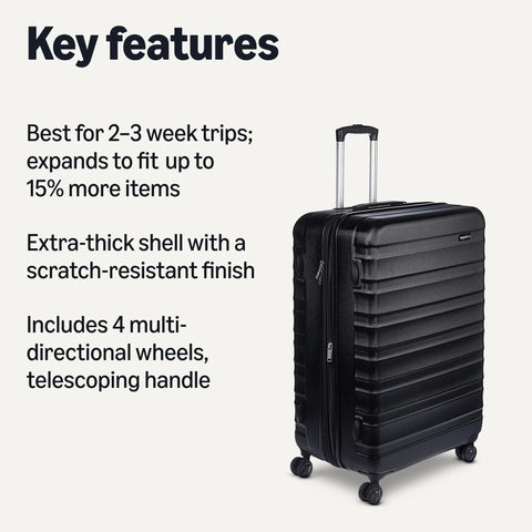 Amazon Basics 30-inch hardside luggage suitcase in black with four wheels and extended telescoping handle