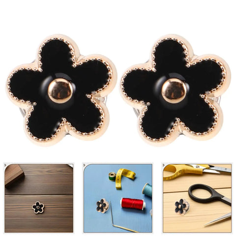 Close-up of Twenty Piece Black Flower Snap Buttons Slick Metal Clip On Fasteners for Apparel Repairs, stylish and functional.