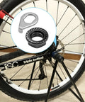 Rear bike wheel with close-up of 12 Piece Bike Wheel Axle Nuts and Safety Washers Kit for Front and Rear Wheels, M8 M9.5 M10 Sizes