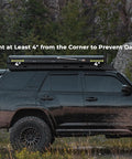 Vehicle with Stainless Steel Awning Mounting Brackets For Rooftop Tent Side Tracks, showing position 4 inches from corner.
