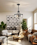 Firedanz 3-Light Glass Pendant Light, Height Adjustable, above a stylish living room with white chairs and plants.