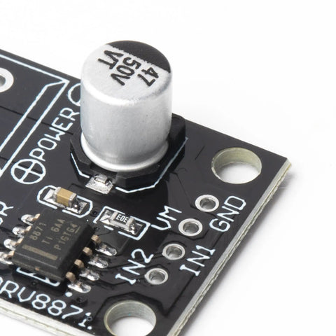 Close-up of 4 Pack Brushed DC Motor Driver Module with PWM control, DRV8871-based H-Bridge for robotics, capacitor and IC visible