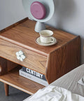 White Flower Petal Cabinet Knob Set Sleek Zinc Alloy Pull Handles With Rhinestone Centers on wooden drawer