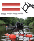 Water Landing Gear For DJI Mini 5 Pro Floating Skid Buoyancy Rod Kit with red rods and black stand on calm water surface