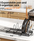 Zero Hassle Expandable Pot And Pan Lid Organizer Rack For Kitchen Cabinets on countertop with adjustable dividers and pot.