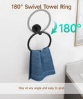 Matte Black 4-Piece Wall Mounted Bathroom Hardware Set with 18-Inch Towel Bar, Towel Ring, Toilet Paper Holder And Robe Hook Made From SUS304 Stainless Steel, Sleek Modern Finish for a Slick, Functional Bath Upgrade, 180° swivel towel ring in use.