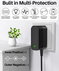 5V 1A Power Supply With 10 Interchangeable Jacks, black compact wall adapter with multi-protection icons and polarity guide