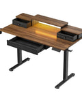Chill 47 Inch Electric Standing Desk With Glowing RGB LED Gaming Table Features Memory Height Settings For Customizable Home Office Or Battle Station Setup, featuring drawers and RGB lighting.