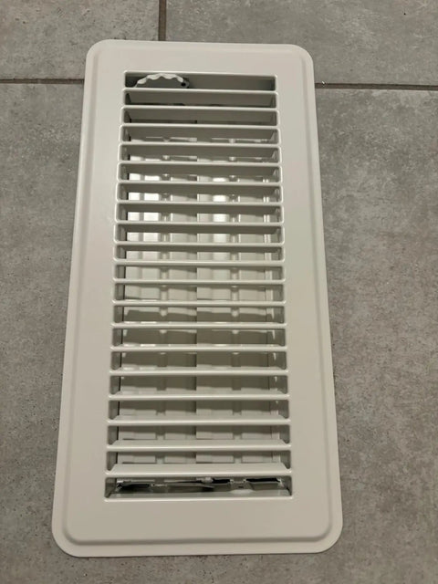 Top view of a Walk-On Ready Floor Register Vent For 4x10 Openings, Heavy Duty White Finish With Adjustable Air Supply Lever.