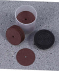 36 Piece Heavy Duty Cutting Discs And Grinding Wheels Set For Metal, Wood, And Ceramics with container on grey surface