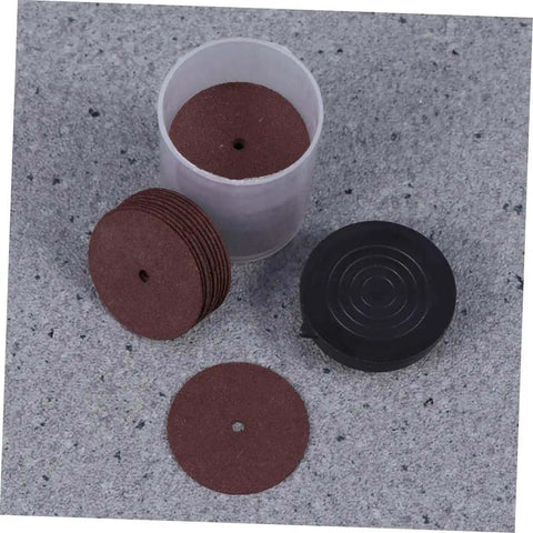 36 Piece Heavy Duty Cutting Discs And Grinding Wheels Set For Metal, Wood, And Ceramics with container on grey surface