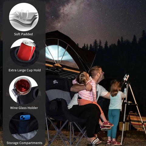 Family using Oversized XL Camping Chair For Adults Built Tough 500 Lb Capacity Padded Headrest at night by a telescope