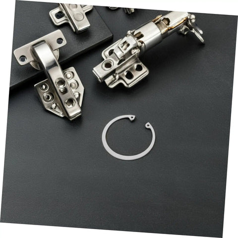 Five Piece Stainless Steel Internal C Clip Snap Ring Set for grooved shafts and studs in machinery, visible ring detail