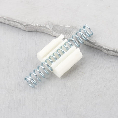 8 Pack Bi Fold Closet Door Repair Springs 60x22mm Replacement Parts featuring a metal spring and plastic housing