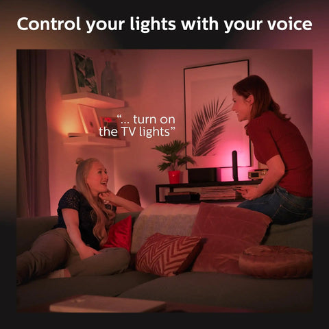 Two people using Smart Play Light Bar Base Kit For Immersive Gaming And TV Ambiance Dope White And Color Ambiance LED
