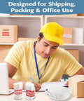 Man packing with Move Day Must Have Moving Dish Packing Supplies Kit With 540 Foam Pouches And Sheets Plus Fragile Stickers
