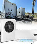 24V Mini Split Air Conditioner With Brushless Motor, cooling units in front of big rig sleeper trucks, showcasing design and function.