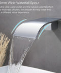 Waterfall Wall Mount Tub Faucet In Brass With Chrome Finish, cascading water into bathtub from 125mm wide spout