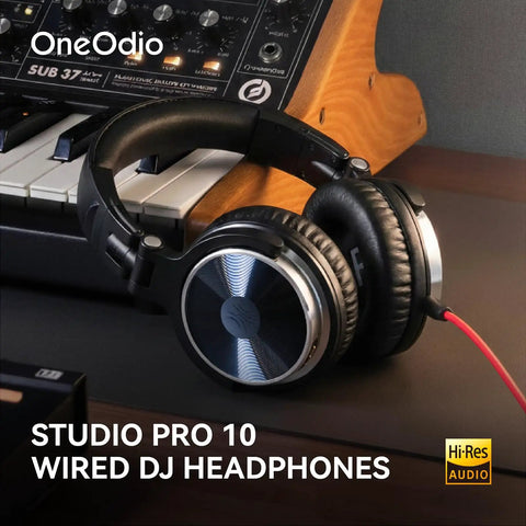 Wired Over Ear Studio Monitoring Headphones With 50mm Drivers For Mixing, DJing And Recording next to keyboard and mixer