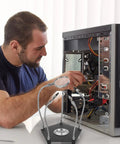 Universal Soldering Helping Hands Tool With Adjustable Arms And Stable Base For PCB Repair, man working on computer