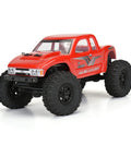 Red RC crawler with Trencher Front And Rear 1 To 24 Scale RC Tire Set With 2.25 Inch Tall Bead-Loc Black Impulse 4 Wheels features.