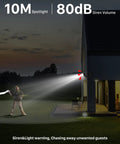 Solar Panel Powered WiFi Outdoor Security Camera Kit With 2K Resolution installed on house with spotlight and siren active