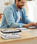 Western Desert Inspired Insulated Lunch Bag With Leakproof Cooler on a desk beside a person working on a laptop.