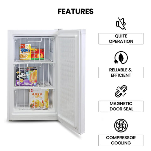 Hella Compact 3.1 Cubic Feet White Upright Freezer With Three Wire Baskets Garage Ready with food items shown inside.