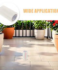 Enjoy Zero Sweat Fixes And Keep Your Greenhouse Sealed Tight Through Any Change With Heavy Duty BOPP Waterproof Patch Tape For Plastic Sheeting Repair Needs on a patio with potted plants.